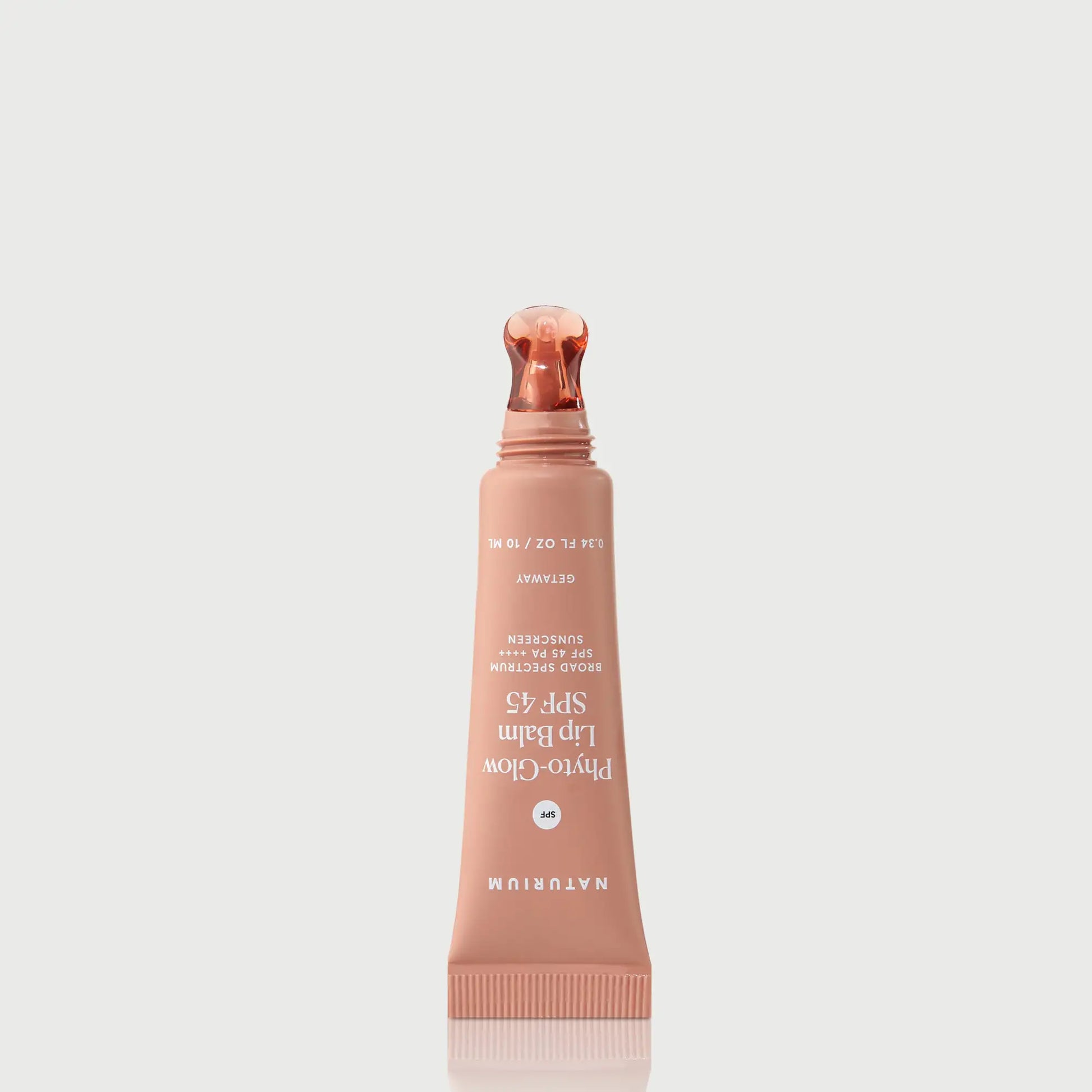 phyto-glow-lip-balm-spf-45-getaway-o2 NATR-10126_PhytoGlow_SPF_Getaway_primary_nocap_bonebkgd_1.webp