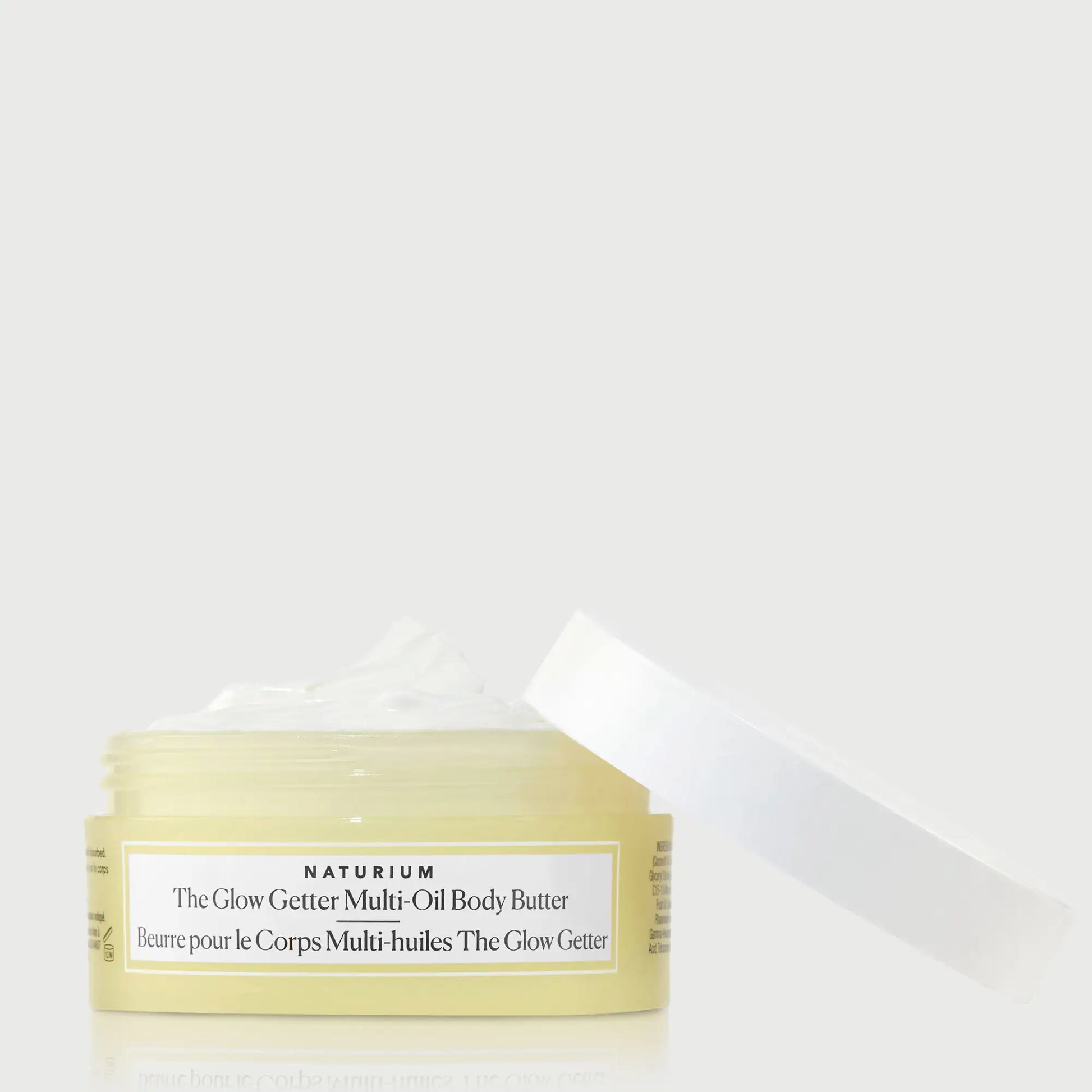the-glow-getter-multi-oil-body-butter-travel-size-j2 NATR-40115_Glow-Getter-Body-Butter-Mini_front_capoff_bonebkgd.webp