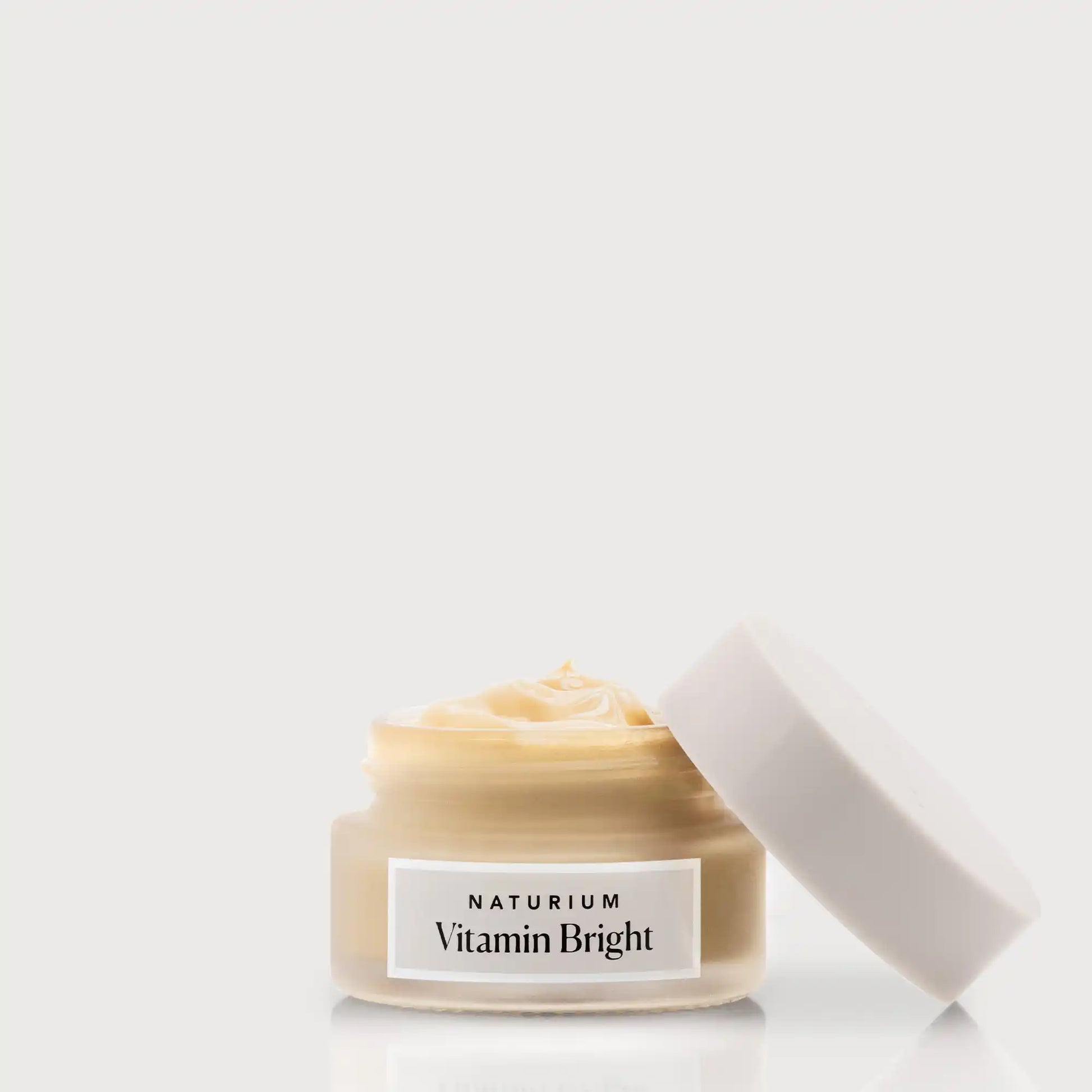 vitamin-bright-illuminating-eye-cream-o0 NATR-VitaminBright_LIGHT_Primary_front_openjar_bone.webp